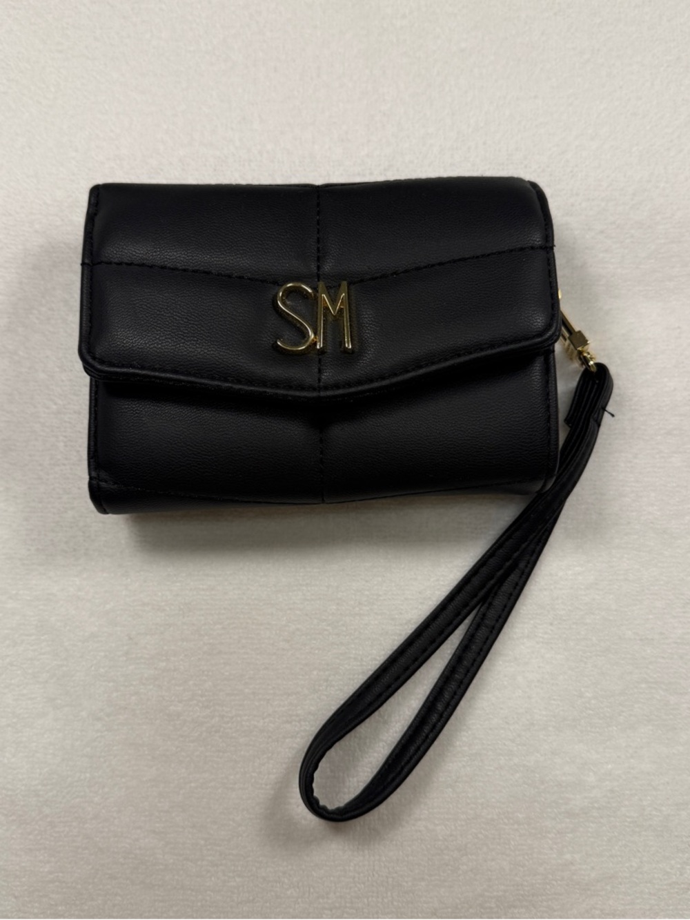 Steve Madden Black Quilted Wristlet with Gold SM Emblem